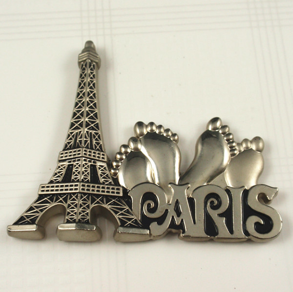 Metal fridge magnet with Paris logo